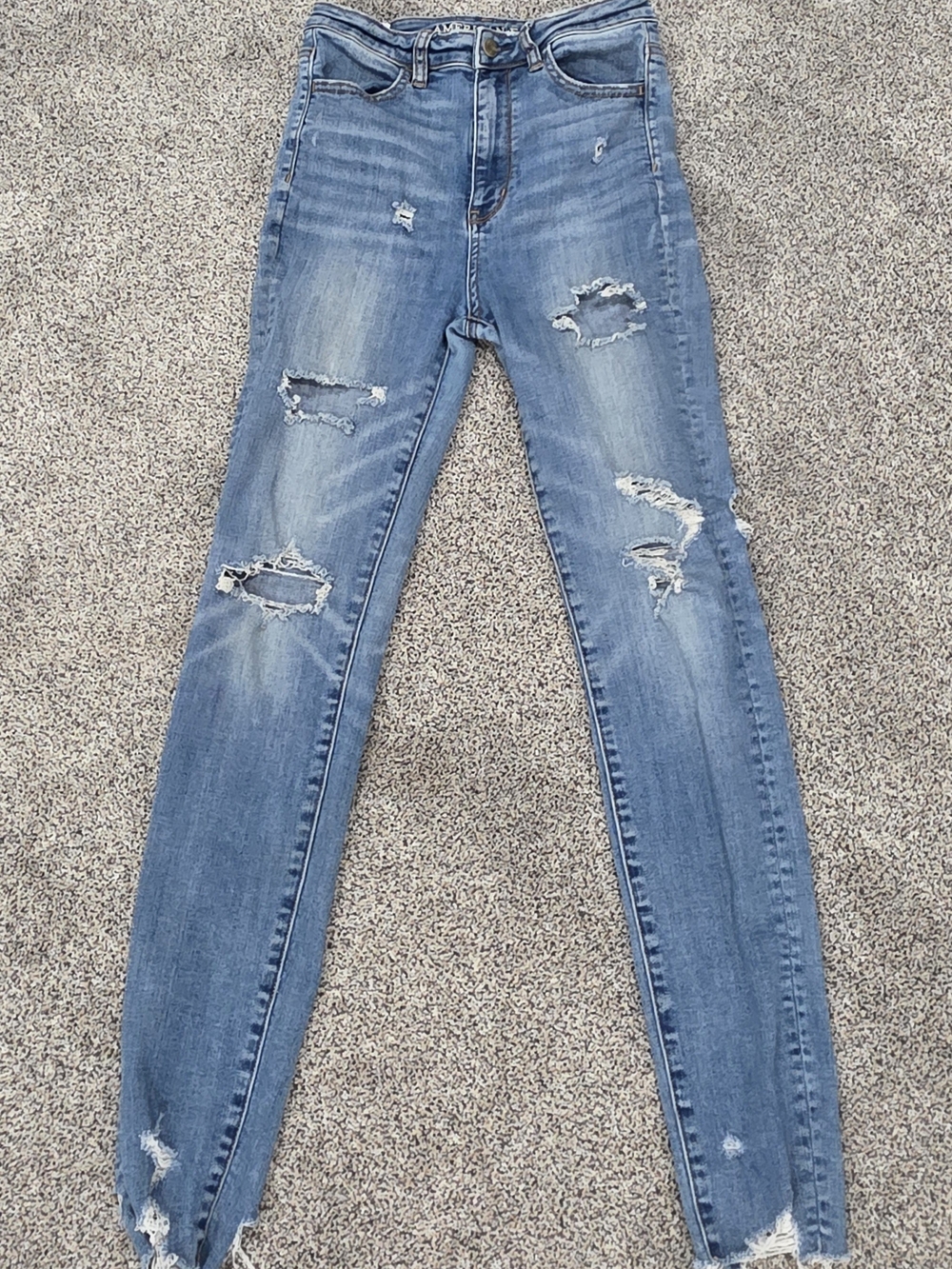 American Eagle Outfitters Light Blue Distressed Highest Rise Jeggings